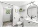 Bathroom with vanity, toilet and combination laundry with stackable washer and dryer at 3030 E 236Th St, Cicero, IN 46034