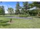 Backyard garden area with organized rows and lush greenery, offering a space for growing plants and vegetables at 3030 E 236Th St, Cicero, IN 46034