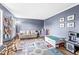 Cozy living room with carpet, sofa, and ample natural light, creating a welcoming space at 3030 E 236Th St, Cicero, IN 46034