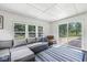 Sun room with natural light, views of the backyard, and a sliding glass door at 3030 E 236Th St, Cicero, IN 46034