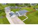 Aerial view showcasing the house, oversized detached two-car garage, above-ground pool, and large backyard at 3113 Westenedge Dr, Columbus, IN 47203
