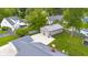 Aerial view of property showcasing detached garage, backyard, and surrounding neighborhood at 3113 Westenedge Dr, Columbus, IN 47203