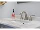 Close-up of bathroom sink and vanity with updated faucet at 3113 Westenedge Dr, Columbus, IN 47203