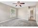 Comfortable bedroom with plush carpet, window and neutral wall at 3113 Westenedge Dr, Columbus, IN 47203