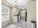 Eat-in kitchen features stainless steel appliances, gray countertops, and light cabinetry at 3113 Westenedge Dr, Columbus, IN 47203