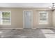 Bright living room featuring wood-look floors, large windows providing natural light, and neutral wall colors at 3113 Westenedge Dr, Columbus, IN 47203