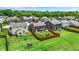 Aerial view of backyard, with patio set, playset and wood fence in suburban neighborhood at 3284 Clary Blvd South Dr, Greenwood, IN 46143