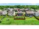 Aerial view of back yards in suburban neighborhood near a line of trees at 3284 Clary Blvd South Dr, Greenwood, IN 46143