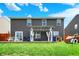 Spacious backyard with lush lawn, featuring a pergola and outdoor seating at 3284 Clary Blvd South Dr, Greenwood, IN 46143