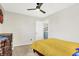 Bedroom featuring neutral walls, ceiling fan, and carpet flooring at 3284 Clary Blvd South Dr, Greenwood, IN 46143