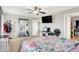 Bedroom featuring a floral bedspread, carpeted floors, and bright neutral colored walls at 3284 Clary Blvd South Dr, Greenwood, IN 46143
