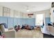 Bright bedroom with blue wainscoting, a ceiling fan, and themed decorations at 3284 Clary Blvd South Dr, Greenwood, IN 46143
