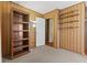 Bedroom features beadboard and wood paneling, shelves and a bookshelf at 3427 Donald Ave, Indianapolis, IN 46224