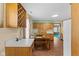 Charming eat-in kitchen with wooden cabinets, dining area, and easy access to other rooms at 3427 Donald Ave, Indianapolis, IN 46224