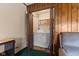 Convenient laundry room features wood paneling and included appliances at 3427 Donald Ave, Indianapolis, IN 46224