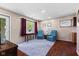 Cozy living room with matching chairs, wooden floors, and ample natural light at 3427 Donald Ave, Indianapolis, IN 46224
