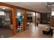 Spacious basement with tile flooring and ample room for recreation and storage at 3431 W Mooresville Rd, Indianapolis, IN 46221