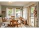 Bright dining room featuring a chandelier, with natural light and stylish decor at 3431 W Mooresville Rd, Indianapolis, IN 46221