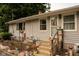 Charming single-story home with landscaped front yard and welcoming entrance at 3431 W Mooresville Rd, Indianapolis, IN 46221