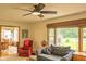 Inviting living room with lots of natural light and a comfortable seating arrangement at 3431 W Mooresville Rd, Indianapolis, IN 46221