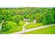 Secluded home nestled among lush greenery with a long private driveway at 3512 N Wakeland Rd, Paragon, IN 46166
