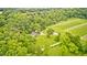 Picturesque countryside home with expansive green lawns and mature trees at 3512 N Wakeland Rd, Paragon, IN 46166