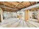 Unfinished basement with concrete floor and exposed beams and ductwork at 3512 N Wakeland Rd, Paragon, IN 46166