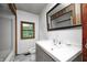 Bathroom with a new vanity, mirror, toilet, and window at 3512 N Wakeland Rd, Paragon, IN 46166