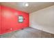 Bedroom with red and white walls, carpet, and a window at 3512 N Wakeland Rd, Paragon, IN 46166