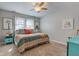 Inviting bedroom filled with natural light, complemented by tasteful decor and a plush bed at 3533 Alexandria Pike, Anderson, IN 46012