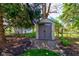 Backyard featuring a storage shed with landscaping at 3533 Alexandria Pike, Anderson, IN 46012