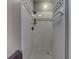 A clean shower stall is lined with classic white tile accented with black geometric trim at 3533 Alexandria Pike, Anderson, IN 46012