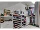 Organized walk-in closet with shelving and hanging space for optimal storage solutions at 3533 Alexandria Pike, Anderson, IN 46012