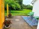 Spacious backyard featuring a back patio area, lush greenery, and a charming privacy screen at 3862 Cornwallis Ln, Carmel, IN 46032