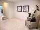 Inviting living room with a comfortable chair, modern art, and a cozy atmosphere at 3862 Cornwallis Ln, Carmel, IN 46032