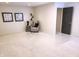 Neutral living room featuring stylish decor and neutral carpeting at 3862 Cornwallis Ln, Carmel, IN 46032