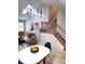 Inviting living room showcases staircase and skylight at 3862 Cornwallis Ln, Carmel, IN 46032