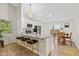 Contemporary kitchen with a breakfast bar, granite countertops, and stainless steel appliances at 3926 Rosefinch Cir, Indianapolis, IN 46228