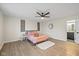 Spacious main bedroom with a ceiling fan and an en-suite bathroom with modern fixtures at 3926 Rosefinch Cir, Indianapolis, IN 46228