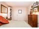Bedroom with built-in shelves and a dresser, as well as neutral-colored walls at 3935 Offshore Dr, Columbus, IN 47203