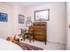 Neutral bedroom features a vintage wood dresser, chair, rug, and light-colored walls at 3935 Offshore Dr, Columbus, IN 47203