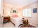 Bright bedroom features a rocking horse, natural light from a window, and neutral walls at 3935 Offshore Dr, Columbus, IN 47203