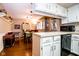 Bright dining area with hardwood floors and ample countertop space for entertaining at 3935 Offshore Dr, Columbus, IN 47203