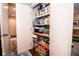 Well-organized pantry with ample shelving, ideal for storing groceries and household essentials at 3935 Offshore Dr, Columbus, IN 47203