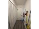 Hallway with closet and access to cleaning supplies at 404 E Madison St, Alexandria, IN 46001