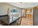 Well-lit kitchen with stainless steel appliances and ample counter space at 410 E Southport Rd, Indianapolis, IN 46227