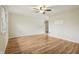 Spacious living room featuring hardwood floors and neutral paint at 410 E Southport Rd, Indianapolis, IN 46227