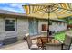 Comfortable backyard deck with dining set, perfect for enjoying outdoor meals at 4125 S Post Rd, Indianapolis, IN 46239