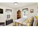 Sunlit bedroom with a comfy bed and decorative touches at 4125 S Post Rd, Indianapolis, IN 46239