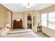 This bedroom has a dresser, open closet, and a cozy patterned bedspread at 4125 S Post Rd, Indianapolis, IN 46239
